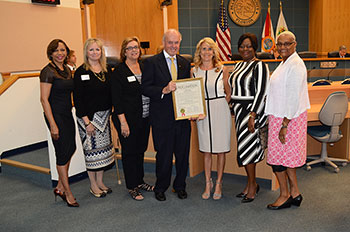 Pictured here (l to r): Denise Albritton, Theresa LePore, Jane Bloom, Vice Mayor Hal R. Valeche, Women’s Chamber of Commerce President Sherry Shive, Rhonda Davis, Office of Small Business Assistance Director Tonya Davis Johnson.